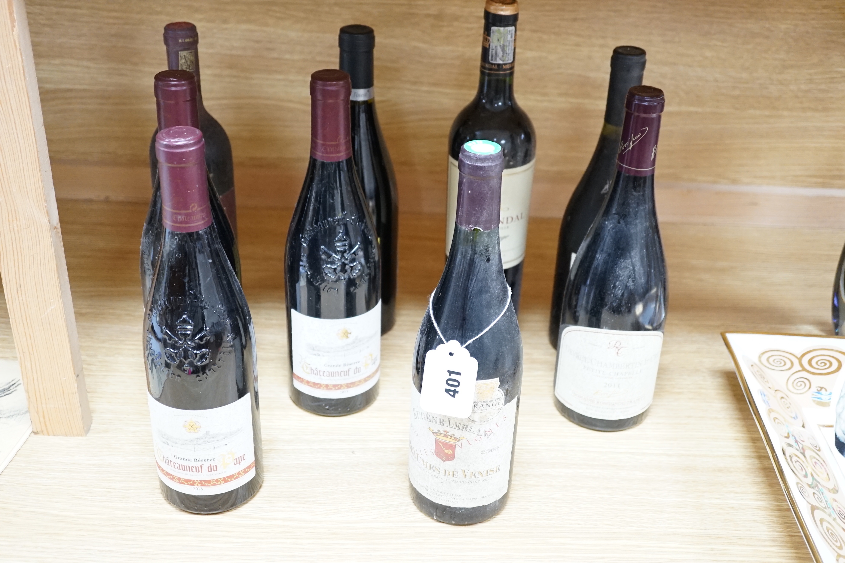 Twelve bottles of wine including Chateauneuf du Pape and Beaumes de Venise